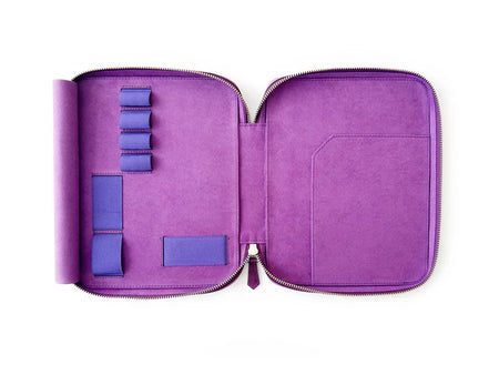 Violet leather pen case with four slots from Eng Leather Co., designed to hold A5-sized pens and accessories.