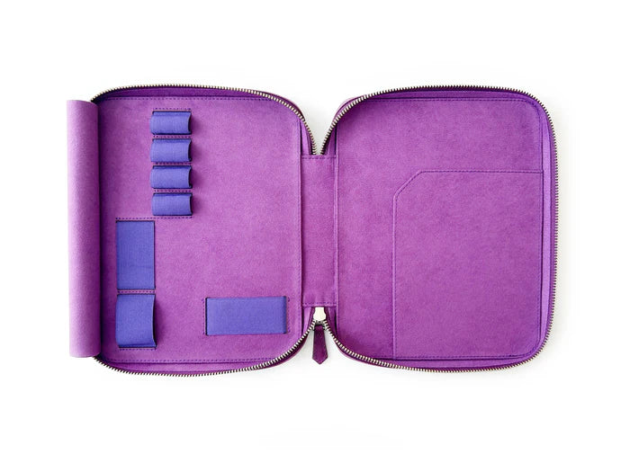 Violet leather pen case with four slots from Eng Leather Co., designed to hold A5-sized pens and accessories.