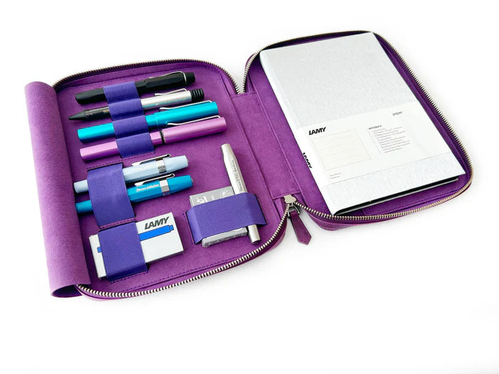 Violet leather pen case with four slots, designed by Eng Leather Co., for organizing A5-sized pens and writing accessories.