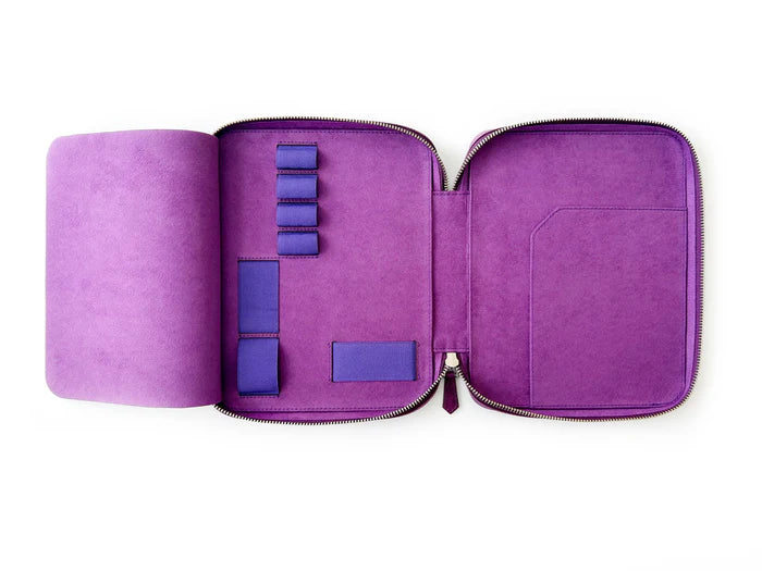 Violet leather pen case by Eng Leather Co. with four slots for A5-sized pens and accessories.