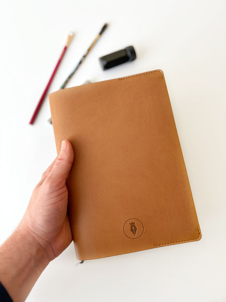 Vegan Apple leather A5 journal cover by Eng Leather Co. with sleek design and secure closure, perfect for protecting notebooks.