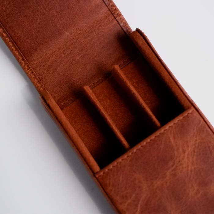 Light brown leather pen case by Eng Leather Co. with a 3-pen capacity, featuring a sleek, durable design and secure closure.