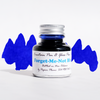 Papier Plume Forget-Me-Not Blue fountain pen ink in glass bottle with ink swatch, vibrant blue color for elegant writing.
