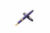 Esterbrook The Rockstar Estie fountain pen with a sleek black body and gold accents, displayed on a white background.