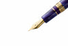 Esterbrook The Rockstar Estie fountain pen with a sleek black and gold design, showcasing its elegant cap and barrel.