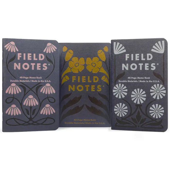 Field Notes Fall Flowers memo book with autumn-inspired floral cover and compact size for note-taking.