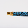 Gioia Capodimonte Kawari gold-trim fountain pen with intricate design and elegant gold accents on smooth nib.