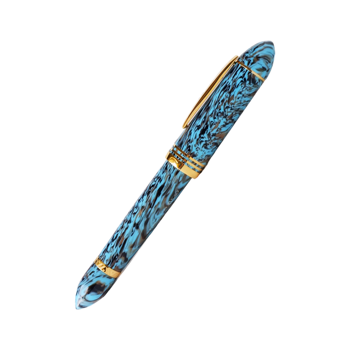 Gioia Capodimonte Kawari gold trim fountain pen with intricate design and glossy finish, showcasing elegant craftsmanship.