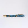 Gioia Capodimonte Kawari gold trim fountain pen with elegant design and fine nib, showcasing luxurious craftsmanship.