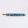 Gioia Capodimonte Kawari gold trim fountain pen with intricate design and elegant gold accents on a white background.