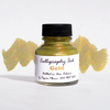 Gold bottled metallic calligraphy ink by Papier Plume, showcasing a smooth, shiny ink suitable for elegant lettering and artwork.