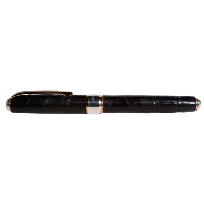 Grifos alligator leather fountain pen with gold accents, showcasing its elegant design and textured leather finish.