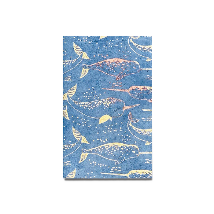Giftsland narwhal journal with whale illustration on cover, featuring lined pages for writing and note-taking.