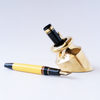 Gold Penwell brass pen holder featuring a classic design with a polished brass finish.