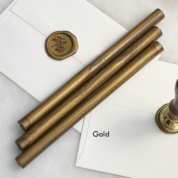 Gold pliable sealing wax sticks by Papier Plume, 7 inches long, flexible wax for sealing and decorative purposes.