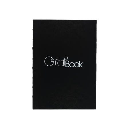 Clairefontaine GrafBook journal with dotted pages and black cover, ideal for writing and sketching.