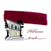 Papier Plume fountain pen ink swatch in vibrant hibiscus red, showcasing smooth, rich color for elegant writing.