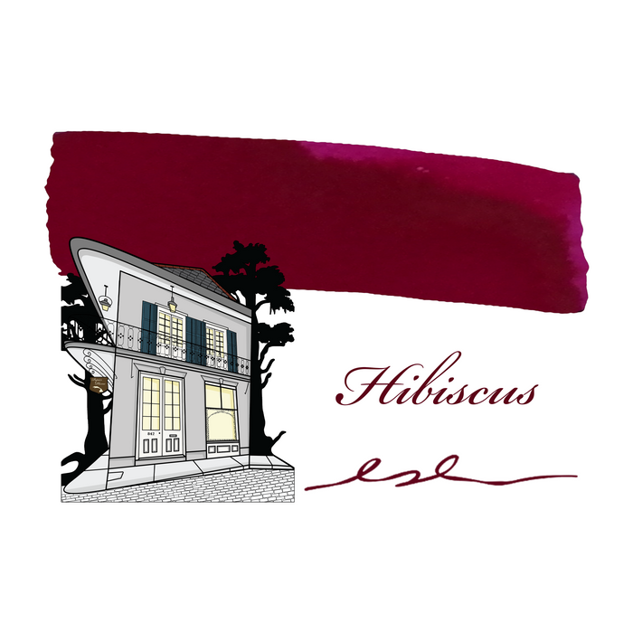 Papier Plume fountain pen ink swatch in vibrant hibiscus red, showcasing smooth, rich color for elegant writing.
