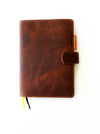Dark Toscano brown leather notebook folio by Eng Leather Co. in A5 size with a sleek, textured leather cover and secure closure.