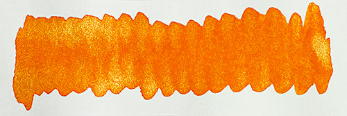 Diamine Shimmertastic Inferno Orange fountain pen ink bottle with shimmering orange ink visible in the glass jar.