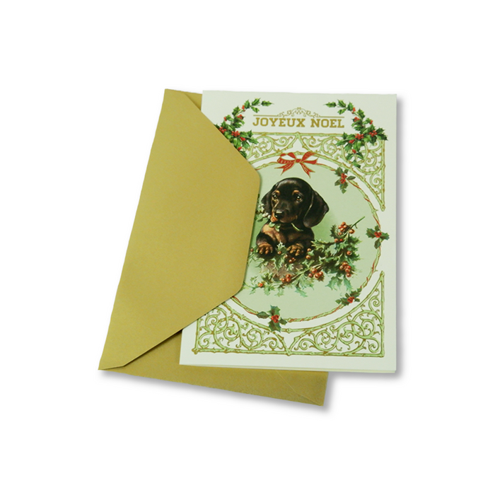 Rossi Christmas card featuring a joyful puppy with "Joyeux Noel" greeting, festive holiday design with colorful accents.