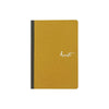 Karatis Amber notebook with Tomoe River paper, featuring a 5x7.5 inch cover in warm amber color.