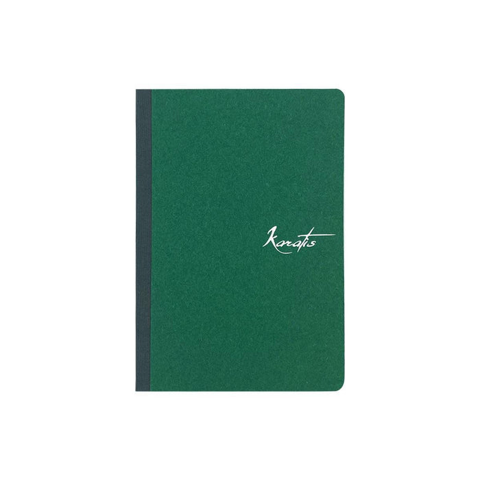 Karatis Selva Tomoe River Paper notebook with a 5x7.5 inch cover featuring a green, textured design and visible binding.