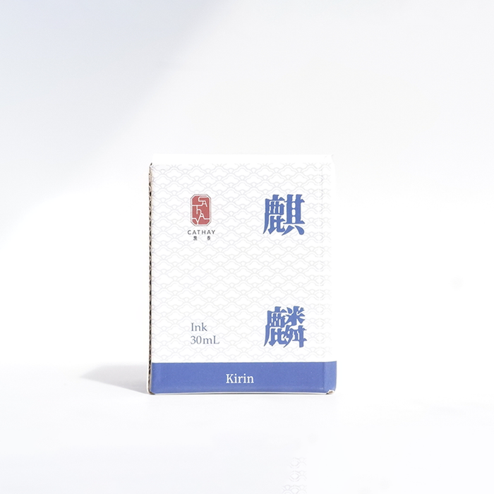 Bottle of Cathay Kirin fountain pen ink with a black cap and clear glass container, showcasing vibrant ink inside.
