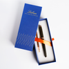 Laban Antique II fountain pen with black and gold design, showcasing elegant craftsmanship and smooth writing style.