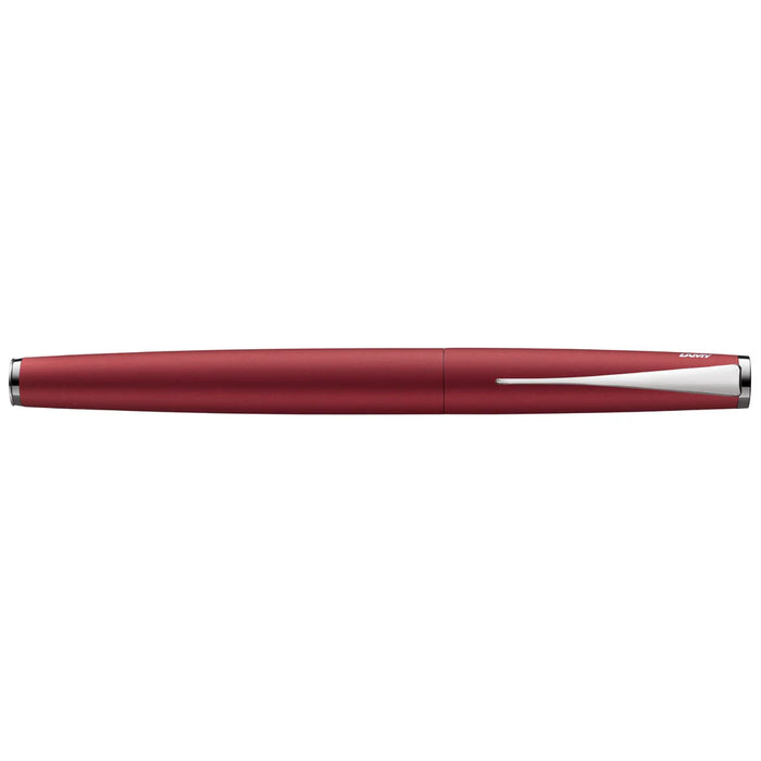 Lamy Studio Royal Red fountain pen with sleek design and gold accents, showcasing its elegant nib and smooth ink flow.