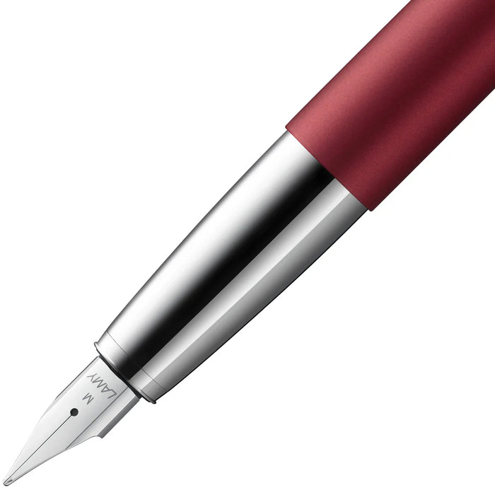 Lamy Studio fountain pen in royal red with a sleek metal body and modern design, suitable for writing and professional use.