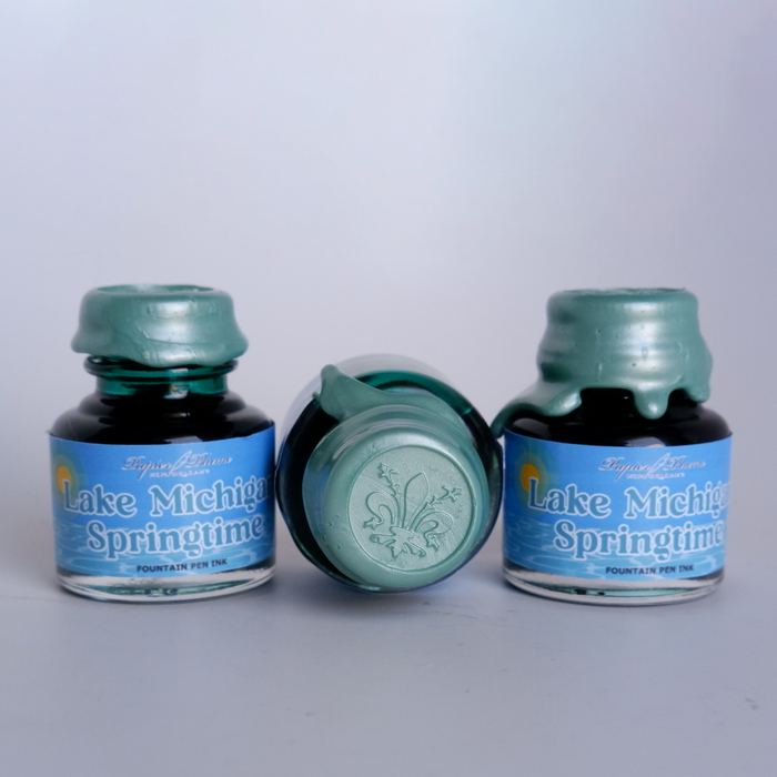 Papier Plume Lake Michigan Springtime fountain pen ink bottle with vibrant blue and green ink, limited edition design.
