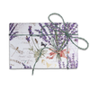 Kartos lavender wrapping paper with a soft floral pattern, perfect for gift wrapping and special occasions.