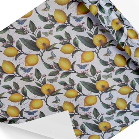 Rossi wrapping paper featuring a vibrant pattern of lemons and butterflies on white background.