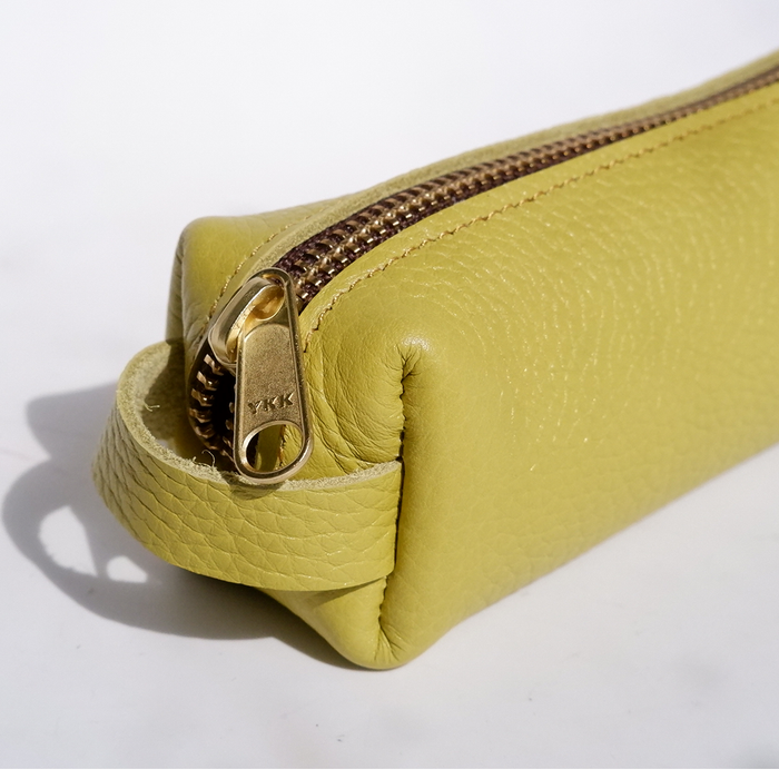 Yellow San Lorenzo pen case with a smooth, compact design, ideal for storing pens and small stationery accessories.