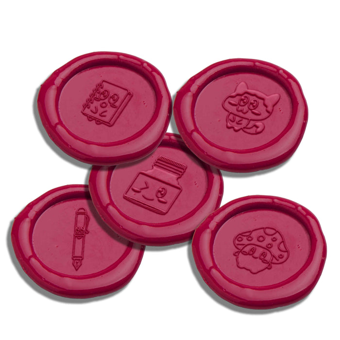 Set of five Papier Plume wax seals featuring colorful, decorative designs for crafting and envelope sealing.