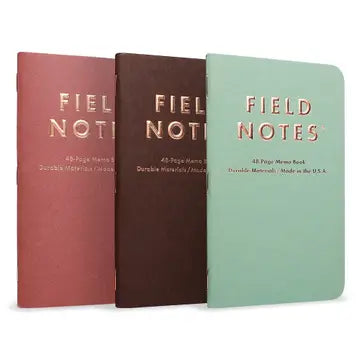 Field Notes Lucky memo pad with kraft cover and lined pages, featuring a vibrant lucky theme design.