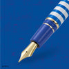 Esterbrook Lucy Estie fountain pen with a comic book background design, showcasing its sleek black body and gold accents.