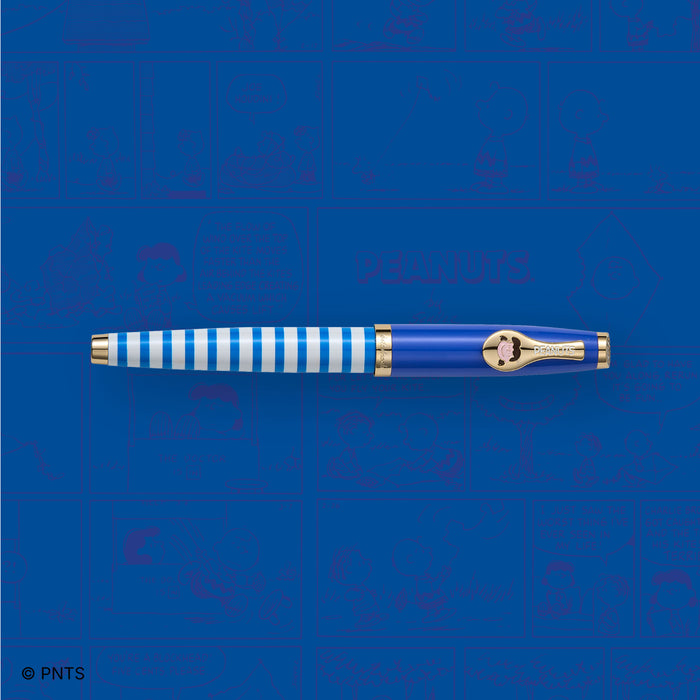 Esterbrook Lucy Estie fountain pen with comic-style background, featuring a sleek design and brand logo on the pen body.