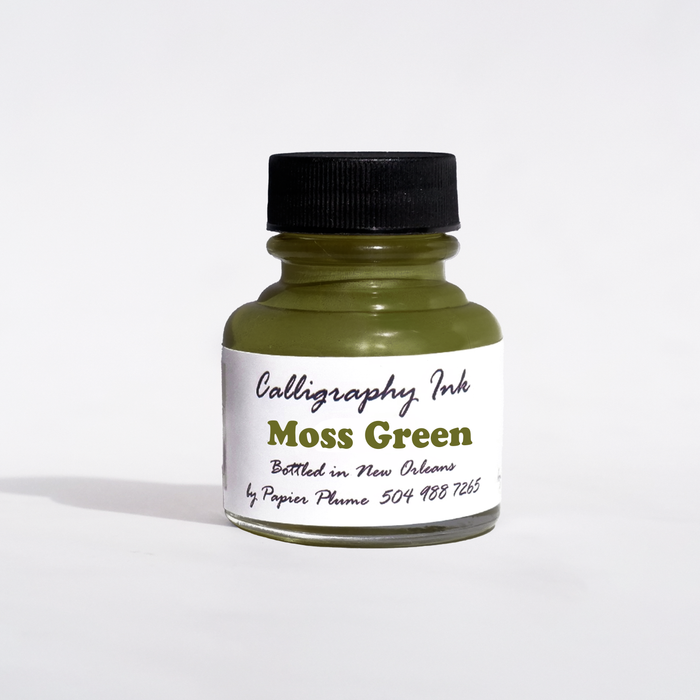 Moss green Papier Plume calligraphy ink in a bottled container, suitable for elegant writing and artistic calligraphy projects.