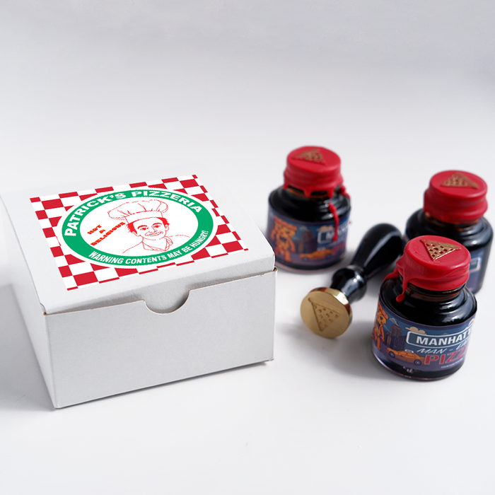 Papier Plume Manhattan Man-Eating Pizza fountain pen ink set with vibrant, pizza-themed ink colors and packaging.