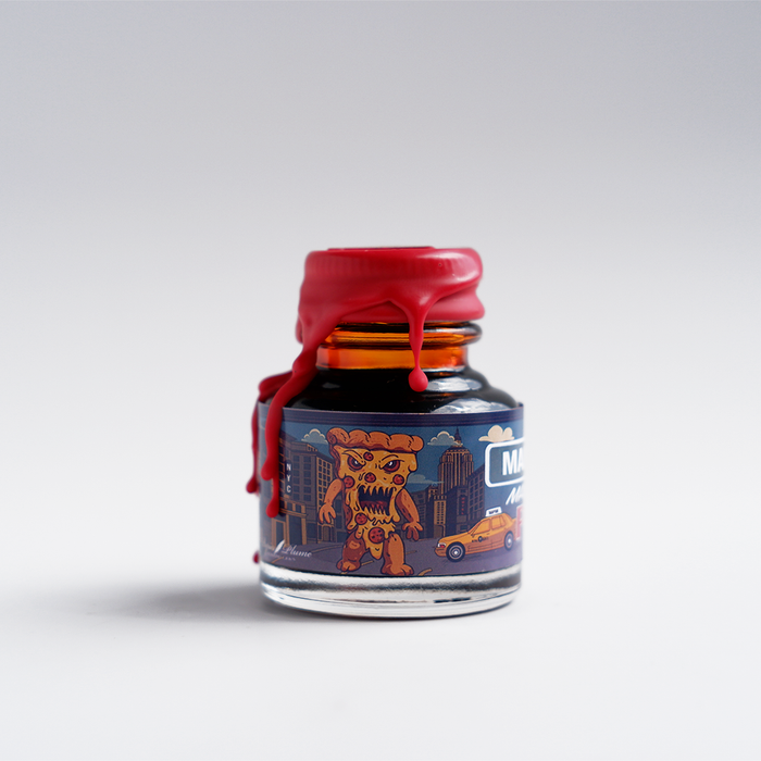 Papier Plume Manhattan Man-Eating Pizza fountain pen ink set with vibrant ink bottles and packaging design.