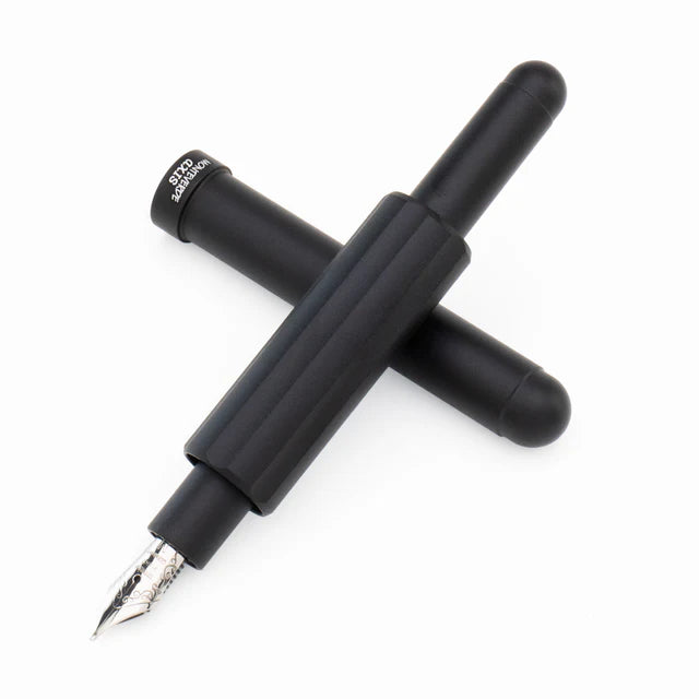 Monteverde Axis fountain pen with black finish and sleek design, featuring a metal clip and smooth writing nib.