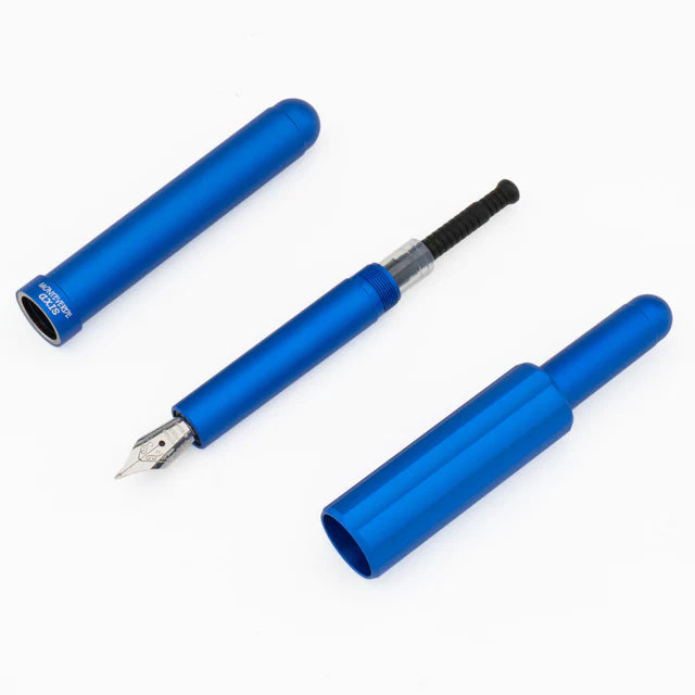 Monteverde Axis fountain pen with black barrel and silver accents, close-up of the pen with refill visible.