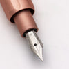 Monteverde Axis fountain pen with sleek black body and gold accents, showcasing its elegant design and fine nib.