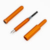 Monteverde Axis fountain pen with orange ink refill, showcasing its sleek design and premium craftsmanship.