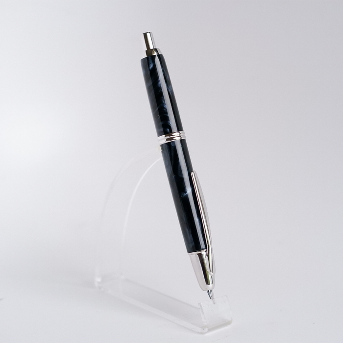 Pilot Vanishing Point SE fountain pen in marble blue with sleek design and gold accents, displayed on a white background.