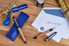 Esterbrook X Crane Mariner fountain pen with blue and gold accents, featuring a sleek design and detailed craftsmanship.