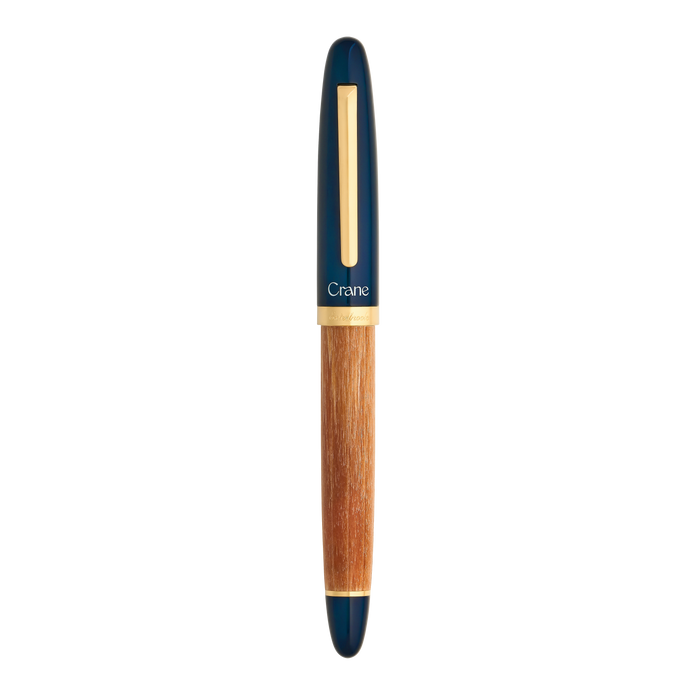 Esterbrook X Crane Mariner fountain pen with closed navy blue body and gold accents, sleek and elegant writing instrument.