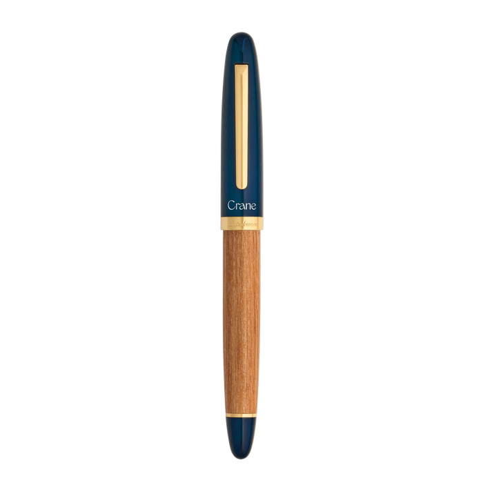 Esterbrook X Crane Mariner fountain pen with closed navy blue resin body and gold accents, elegant writing instrument.